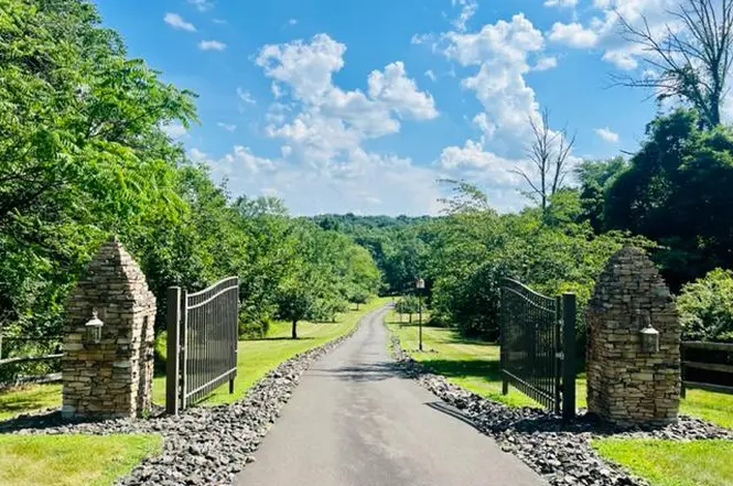 UCC Foreclosure - Membership Interests in 2 LLCs, with residential property in PA